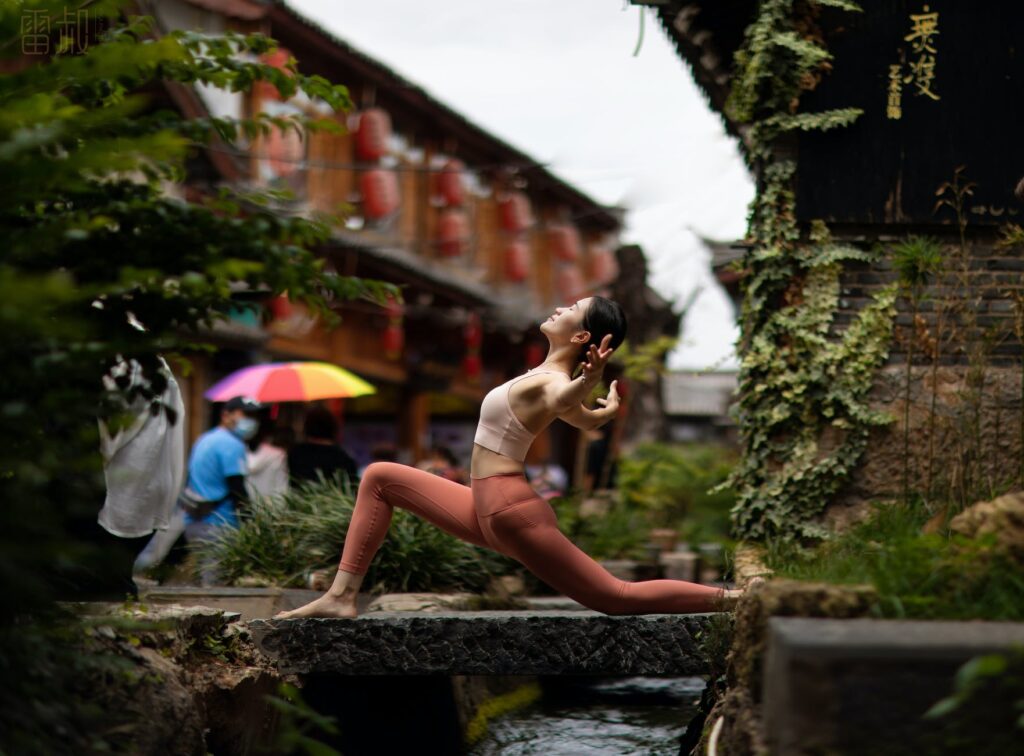 a woman in activewear doing yoga
