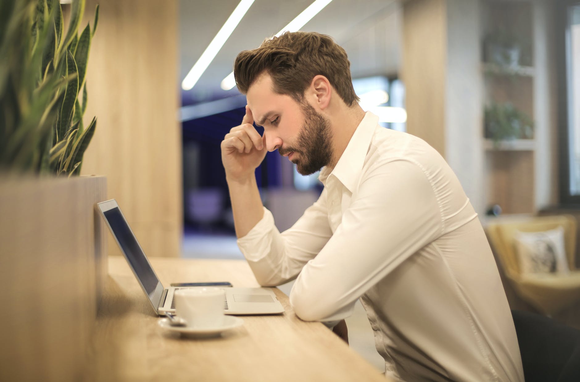 Think on these things on simple 7 points, avoid regret | man with hand on temple looking at laptop