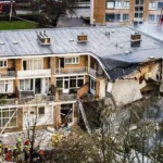 Bomb attack in The Hague kills six, injures four. Police suspect terrorism. Rescue teams continue search. Queen Maxima and King Willem-Alexander visit site.