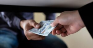 Graduate-level course outline on Corruption and Its Control, exploring causes, consequences, anti-corruption strategies, legal frameworks, case studies, and future challenges.